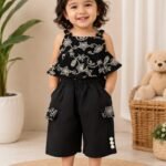Sleeveless ruffle top with Pair of wide-leg culotte pants
